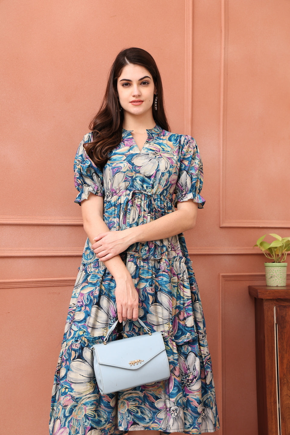 Close-up of premium Chanderi fabric on blue dresses for women