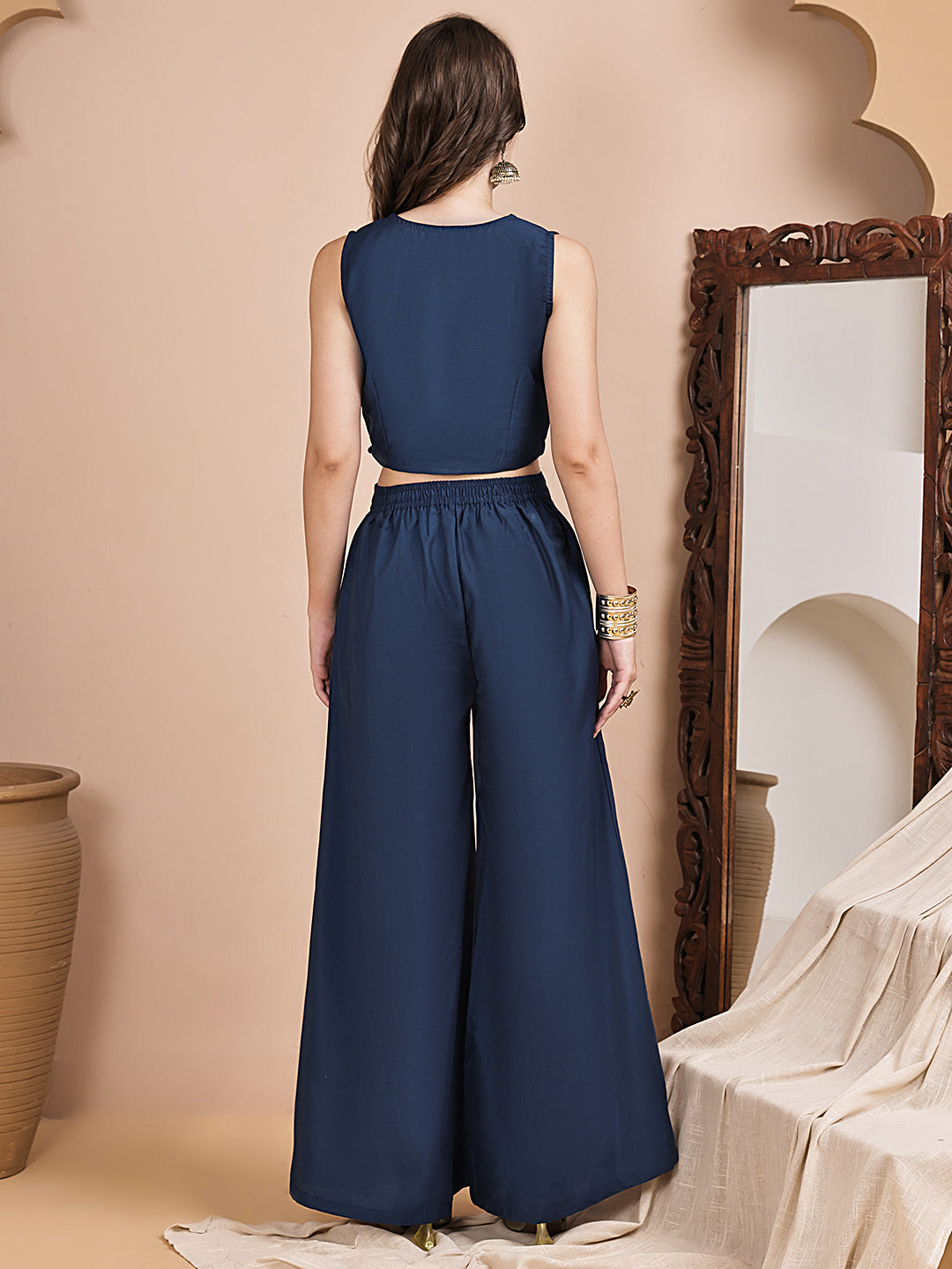 Back view of model styling blue co-ord outfit