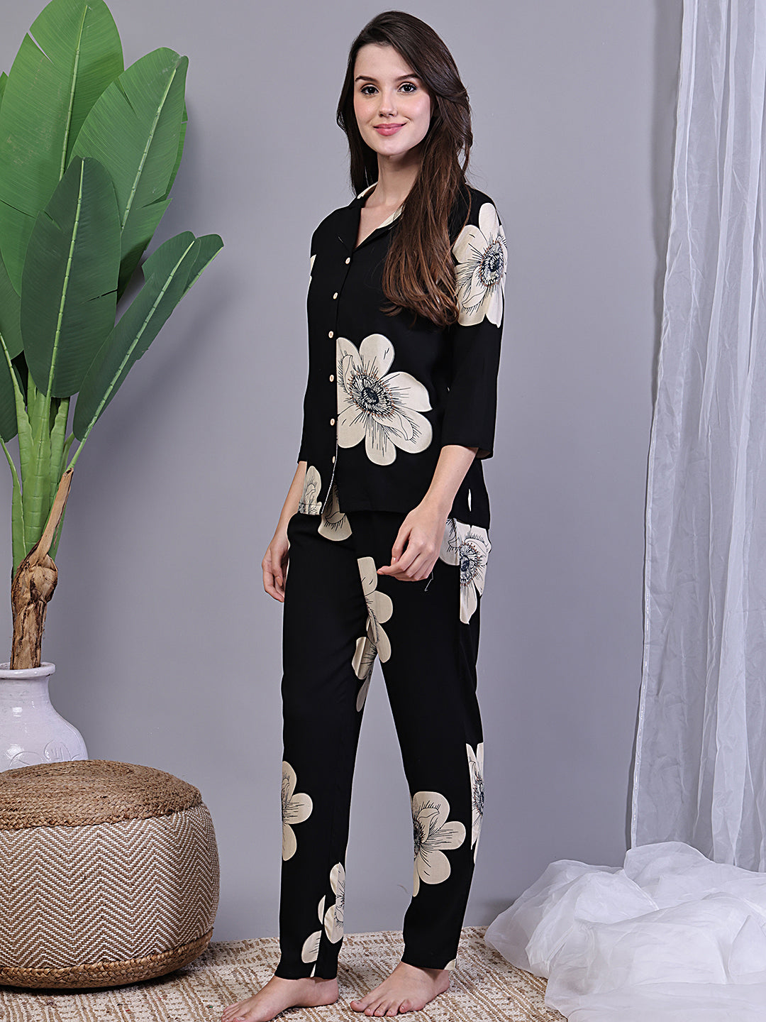 Back view of model in Black Printed Night Suit