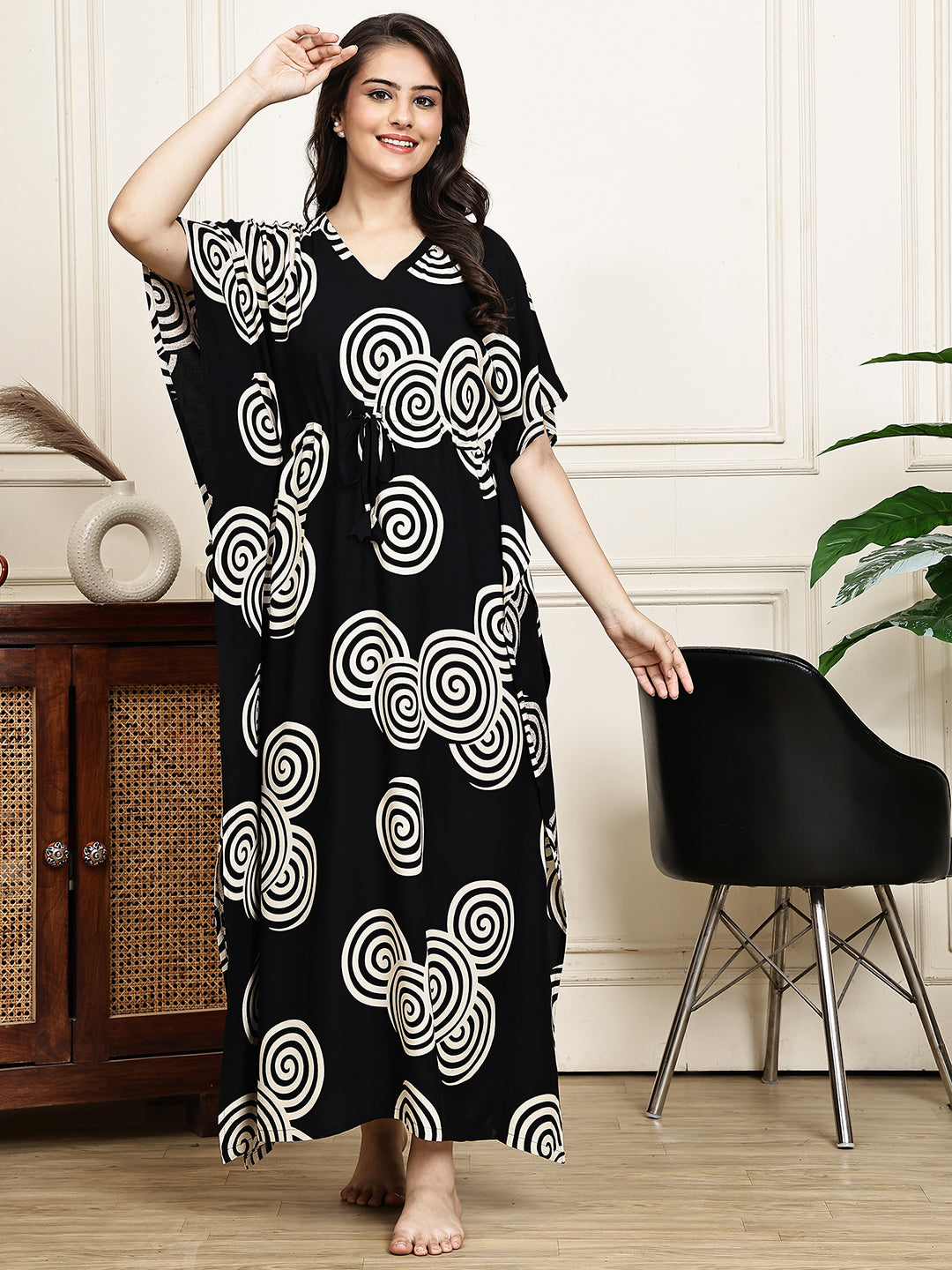 Woman wearing black abstract printed Kaftan Dress