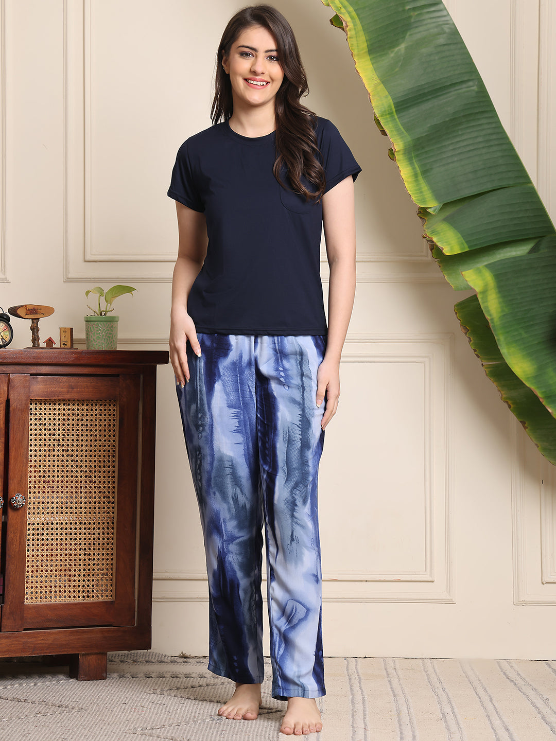 Woman wearing Blue Solid Printed Night Suit