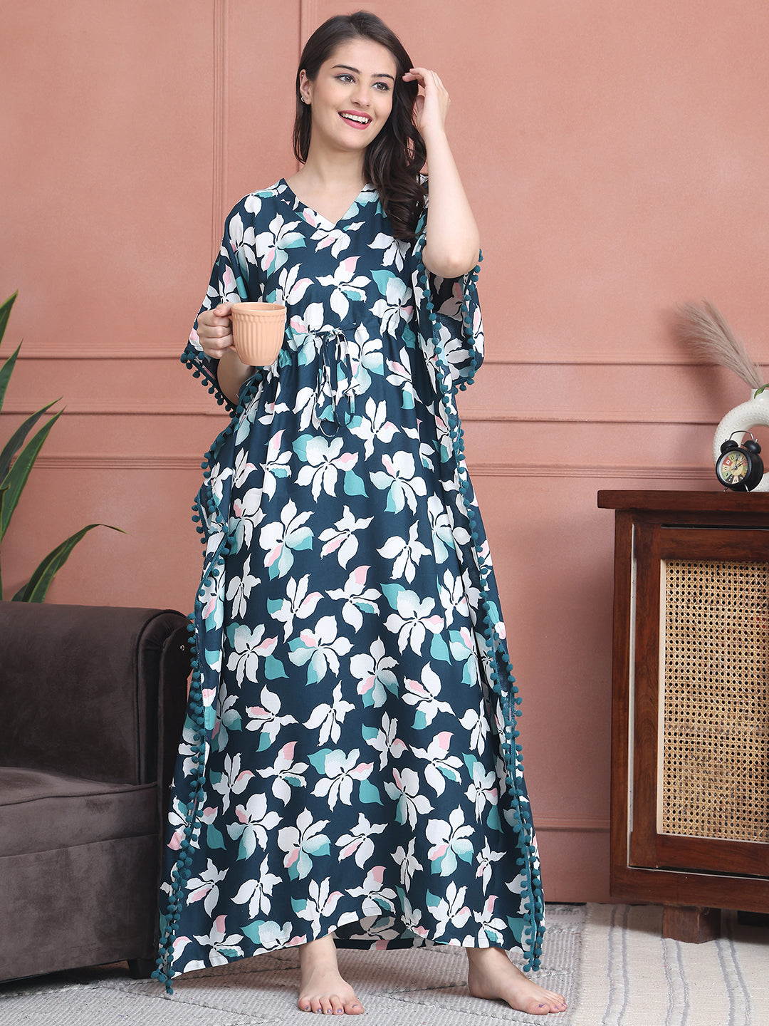 Woman wearing green abstract printed Kaftan Dress