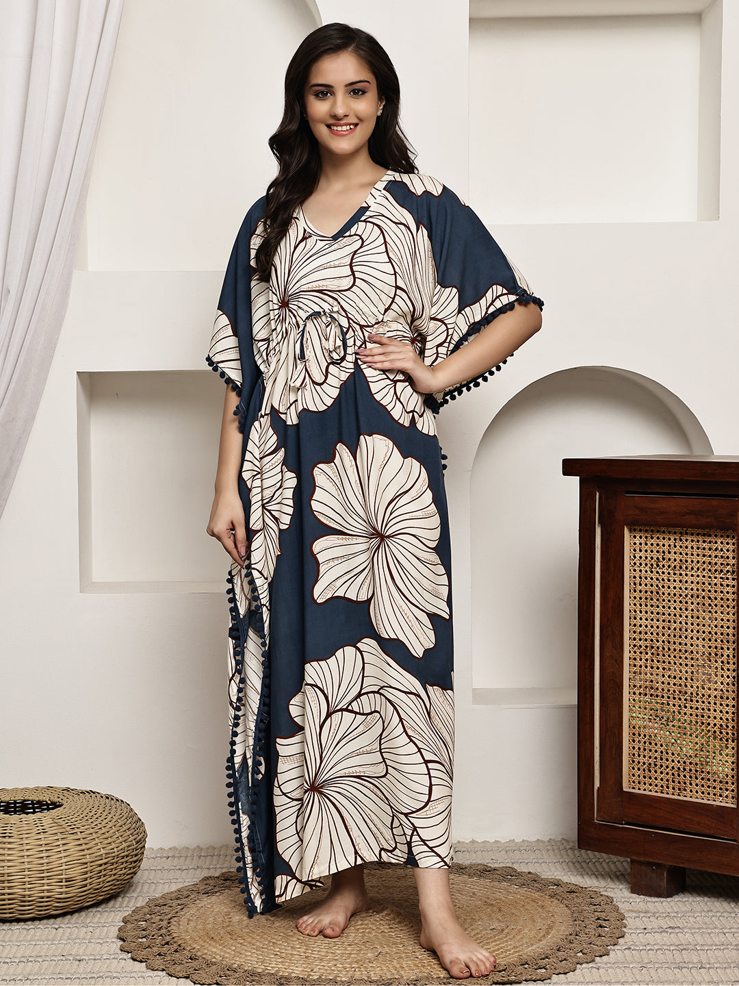 Woman wearing blue floral printed Kaftan Dress
