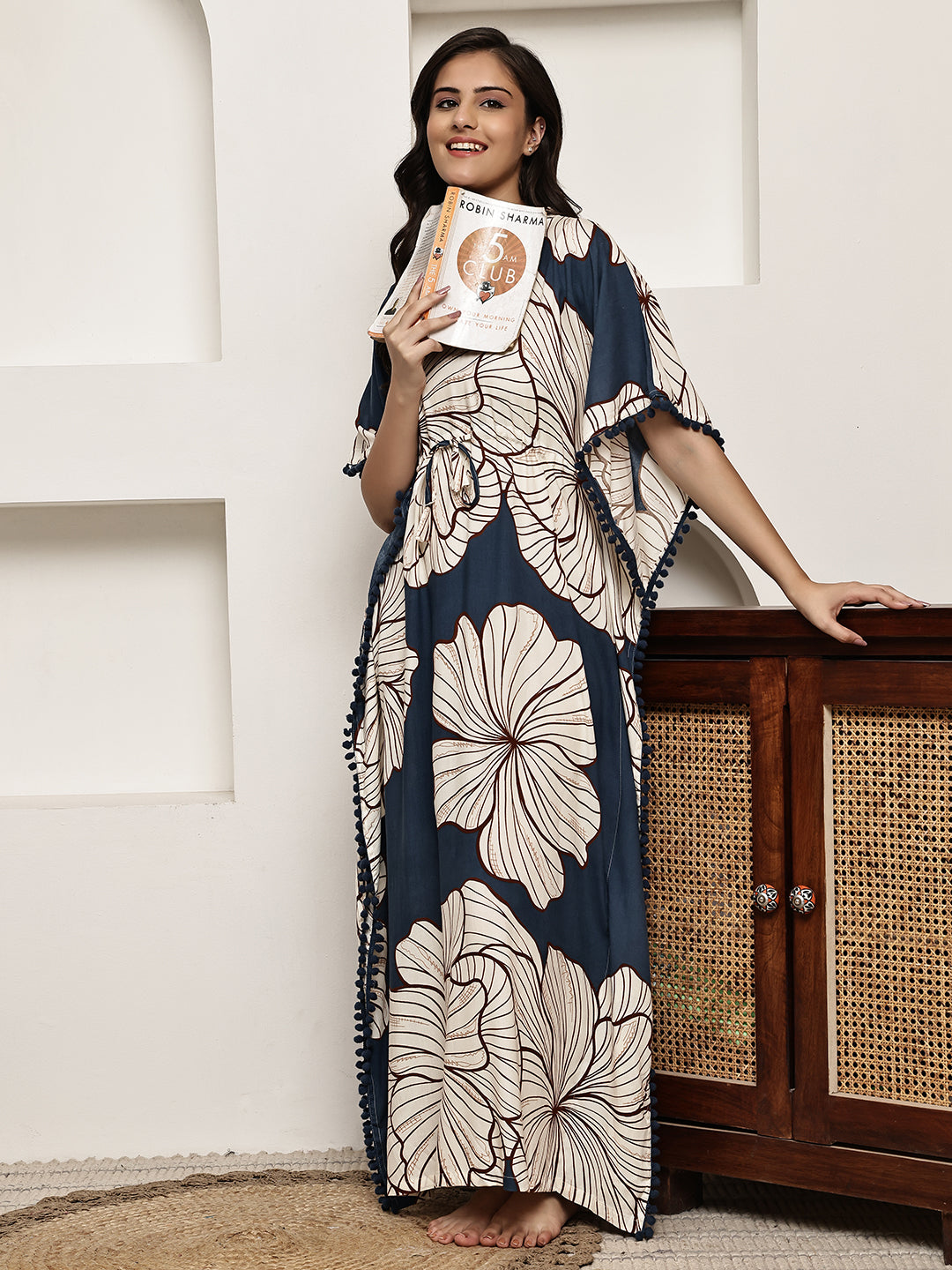 Close-up of viscose rayon fabric on blue floral Kaftan Dress