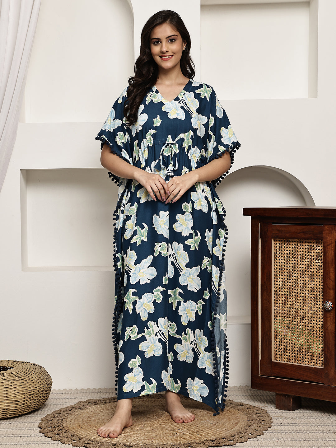 Woman wearing blue floral printed Kaftan Dress