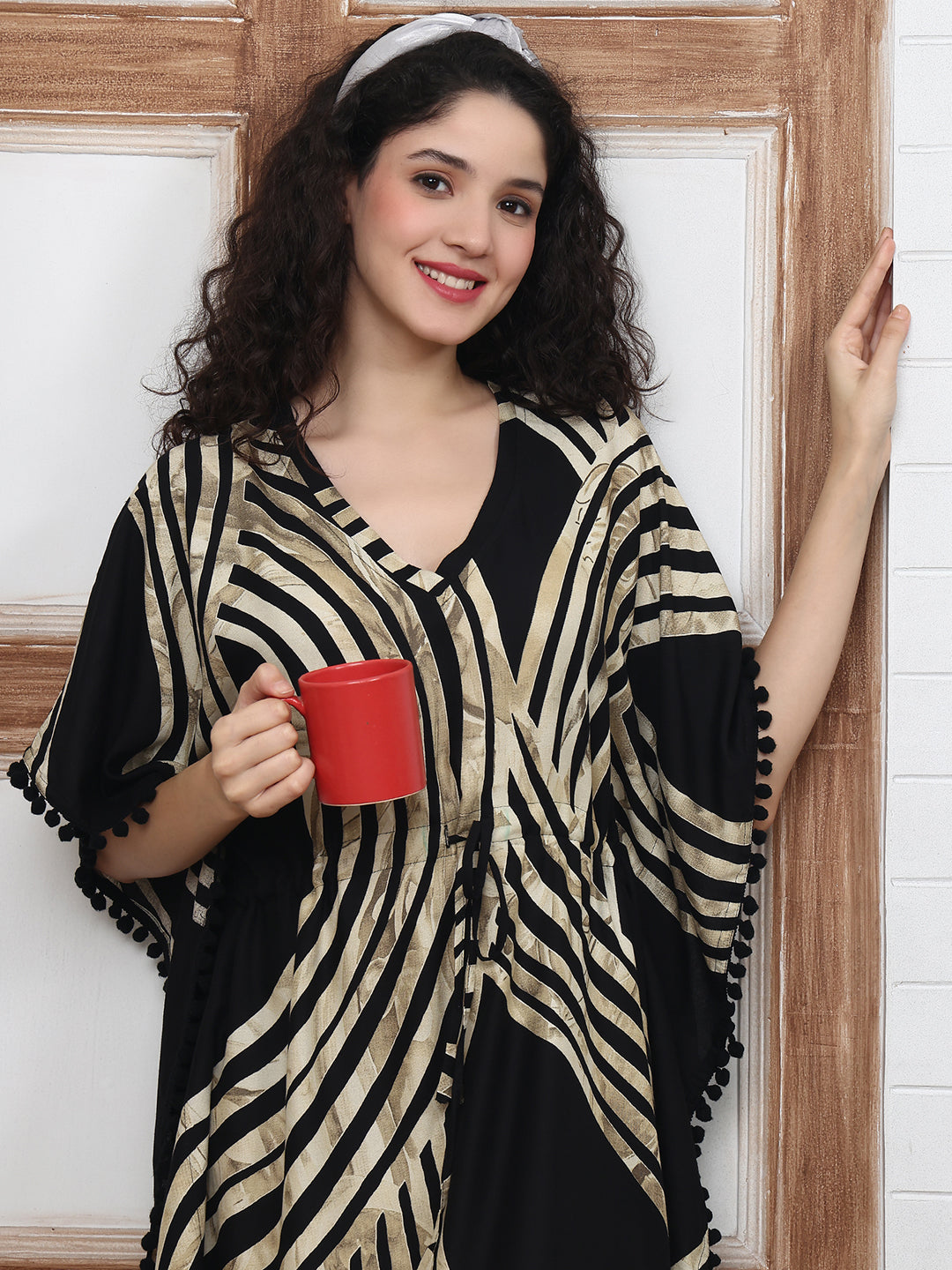 Close-up of viscose rayon fabric on black Kaftan Dress