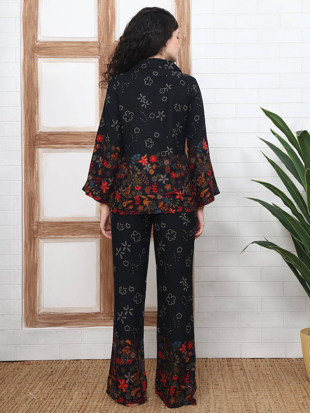 Back view of model in Black Printed Night Suit