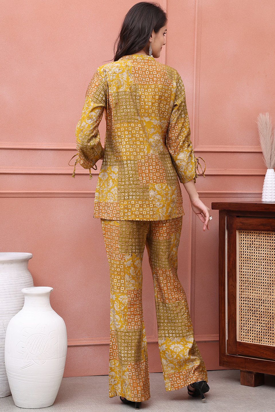 Back view of model styling Mustard co-ord outfit