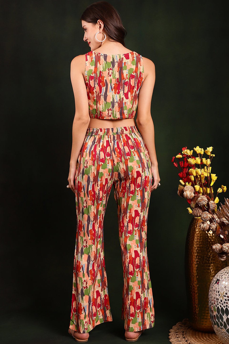 Back view of model styling Red co-ord outfit.