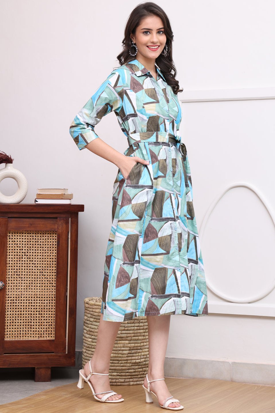 Lifestyle shot of abstract printed blue cotton dresses