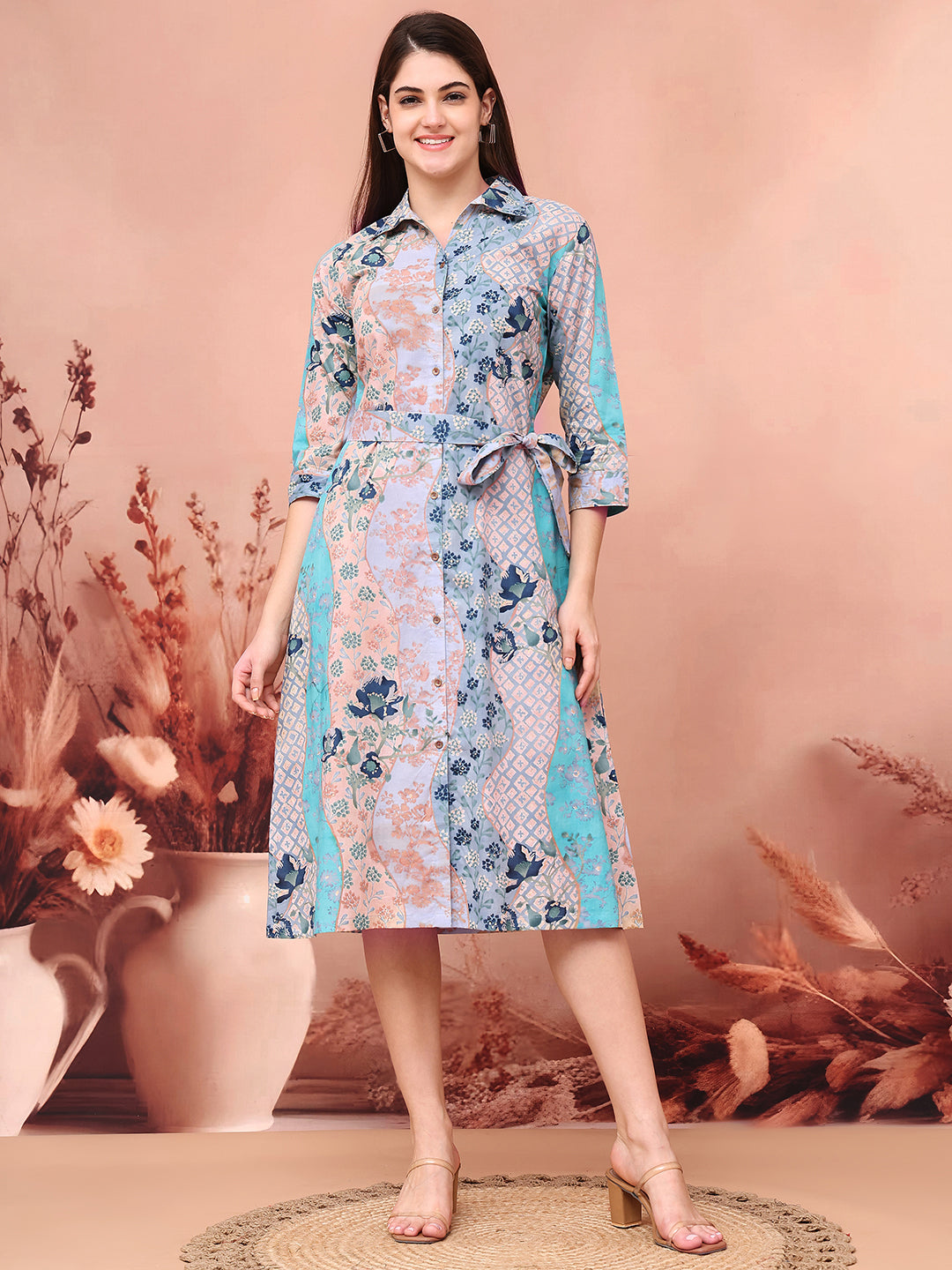 Blue rayon dress with floral print and short sleeves