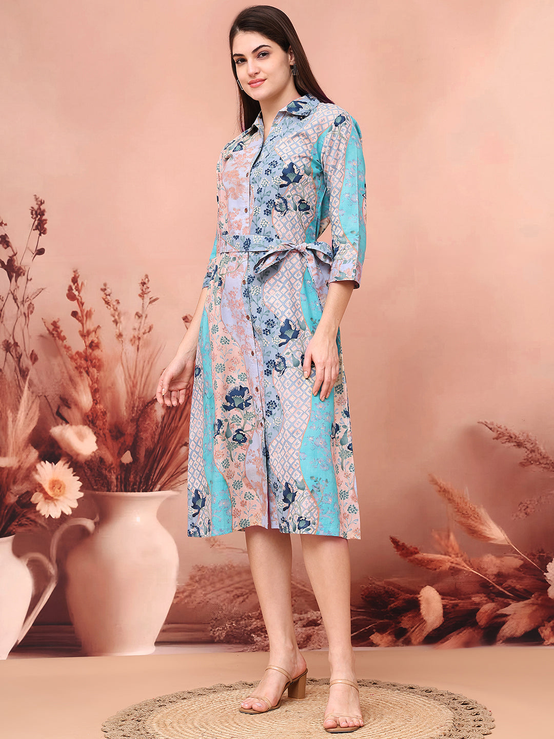 Lifestyle shot of blue floral printed rayon Dresses