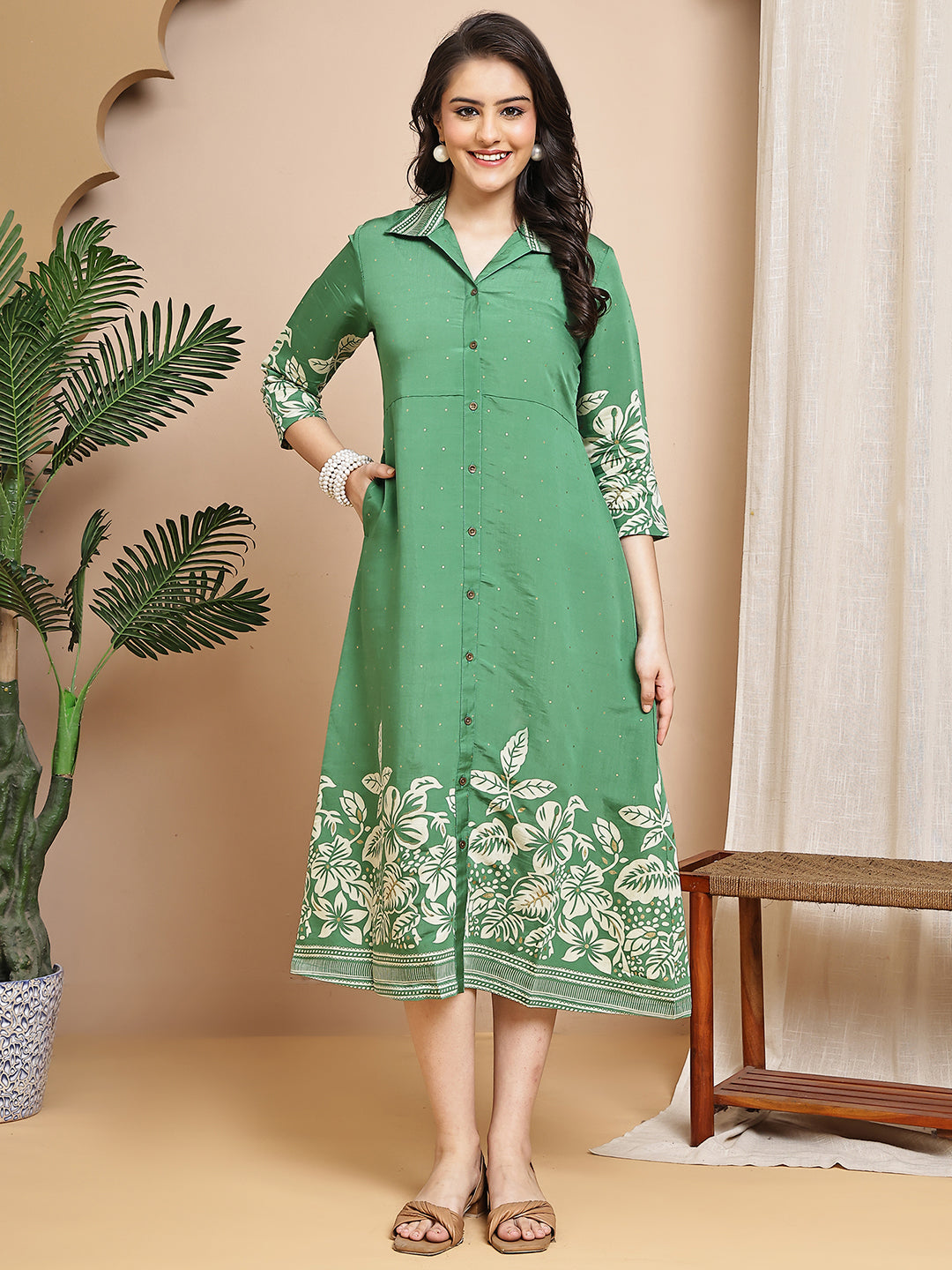 Woman wearing green floral printed Chanderi dress