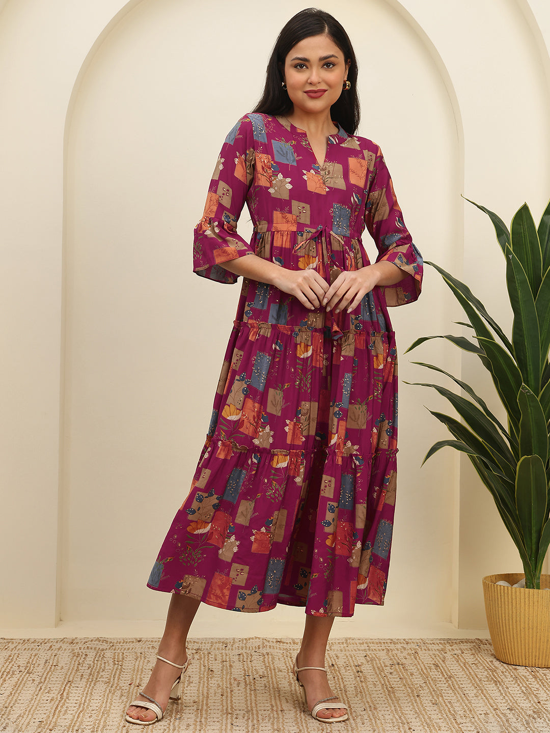 Woman wearing Magenta Abstract Printed Dress