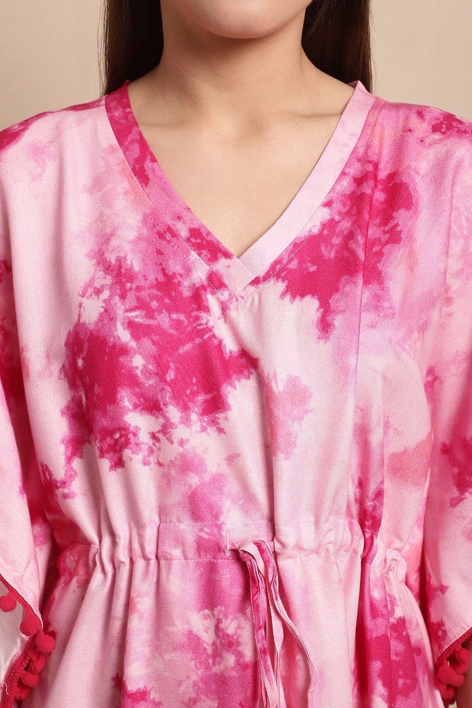 Close-up of lace detail on pink rayon Kaftan Dress
