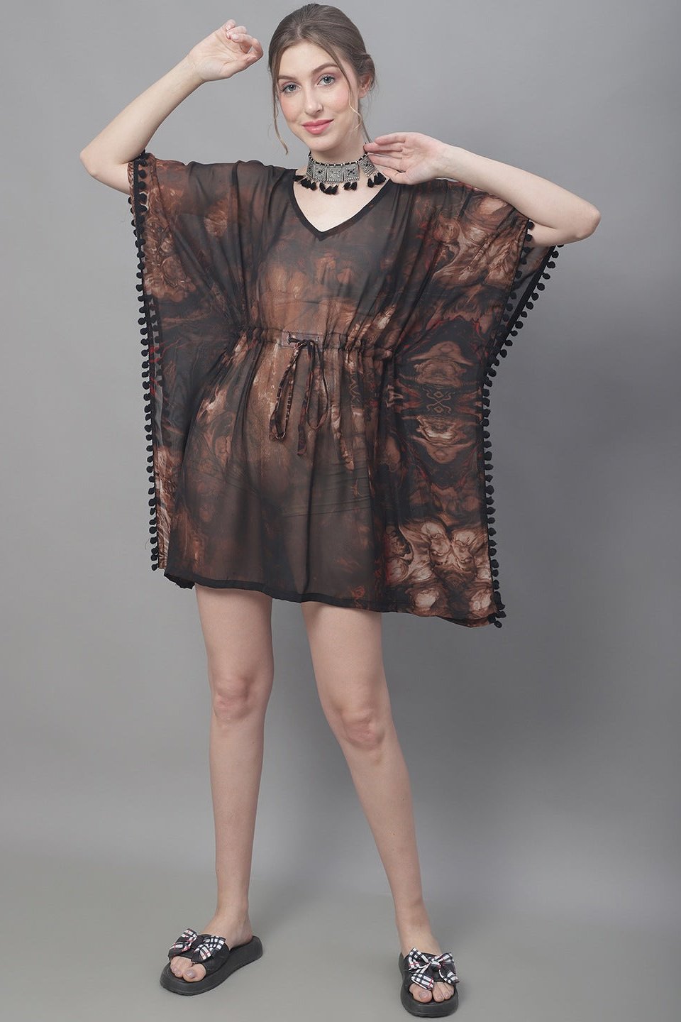 Close-up of Georgette Fabric on Brown Beach Dress