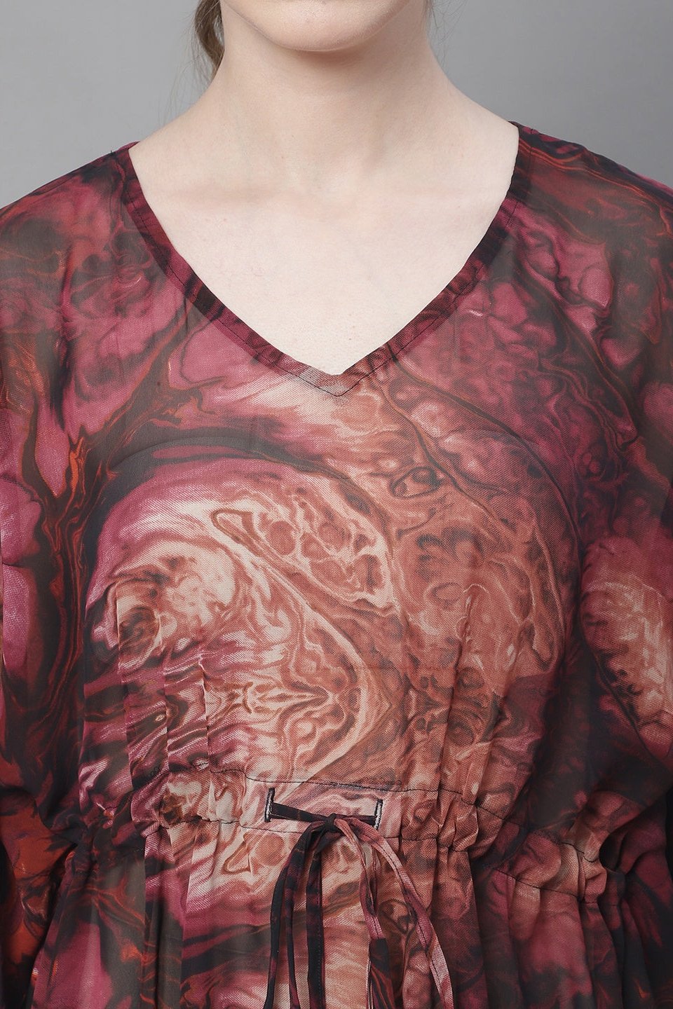 Close-up of georgette fabric on wine beach dress