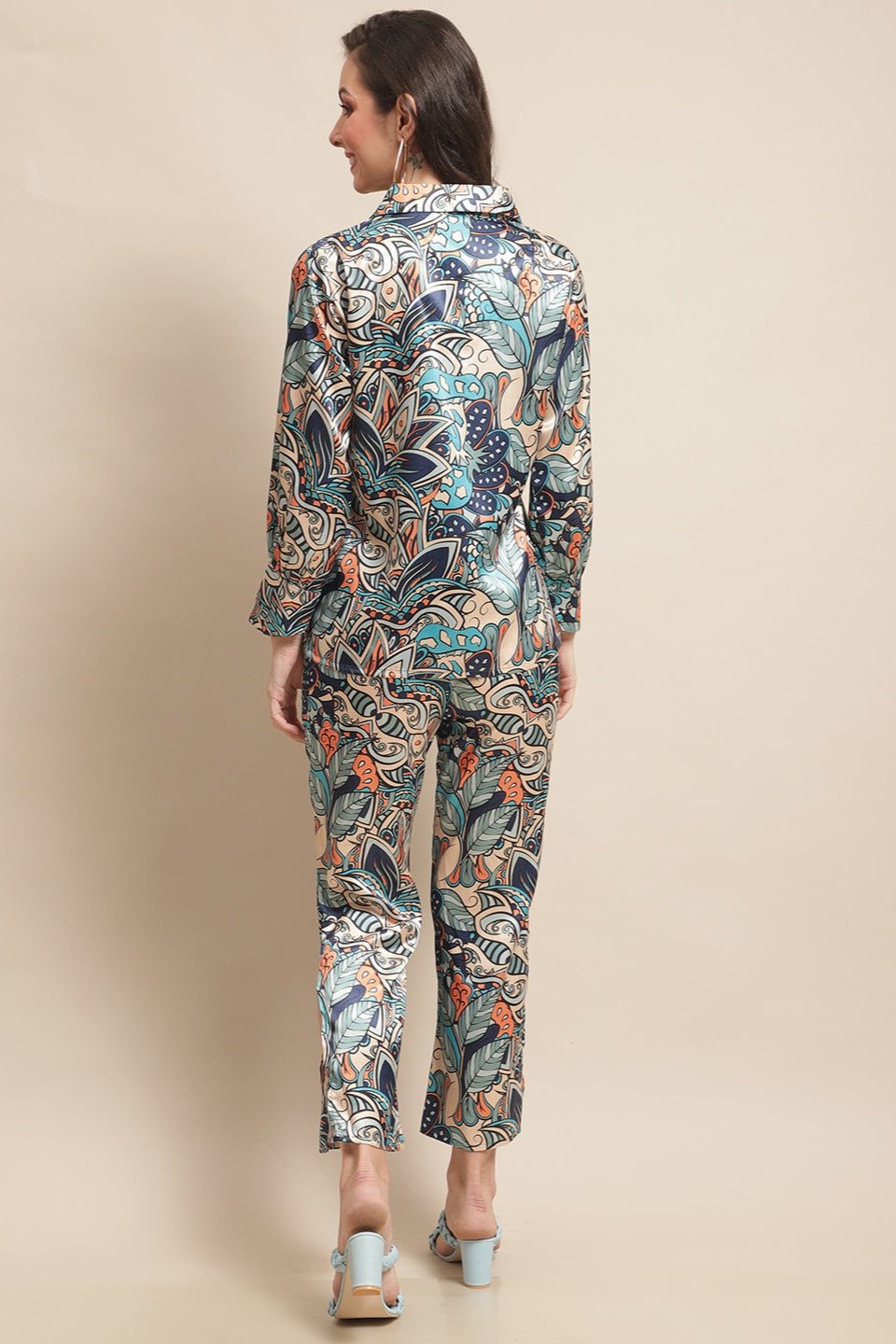 Back view of a model styling the multi-color abstract co-ord outfit.
