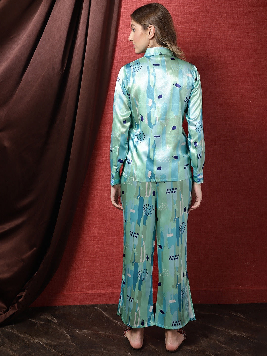 Lifestyle shot of the blue motif print Co-Ord Set worn outdoors.