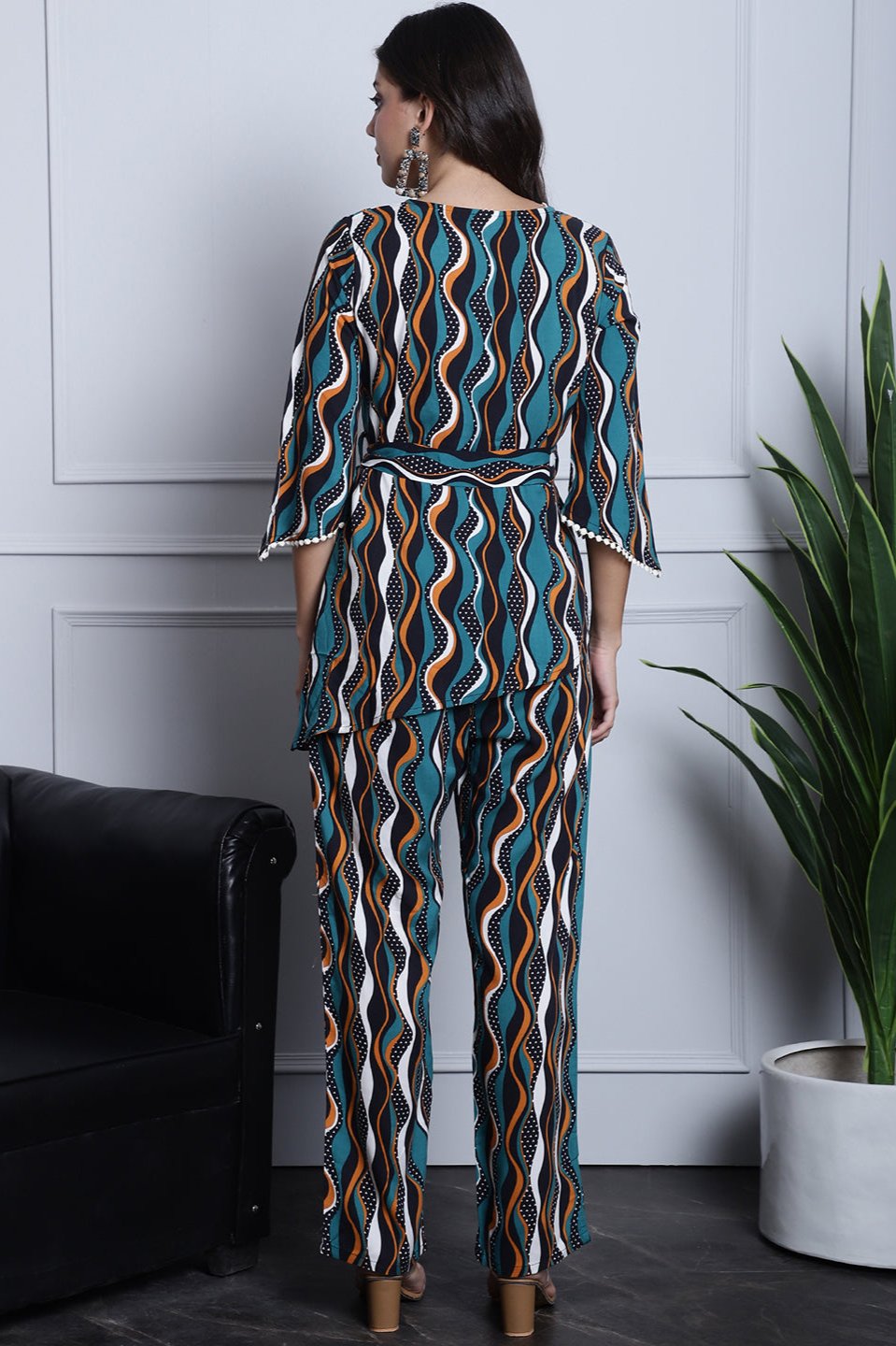 Lifestyle shot of the geometric print co-ord set outdoors.