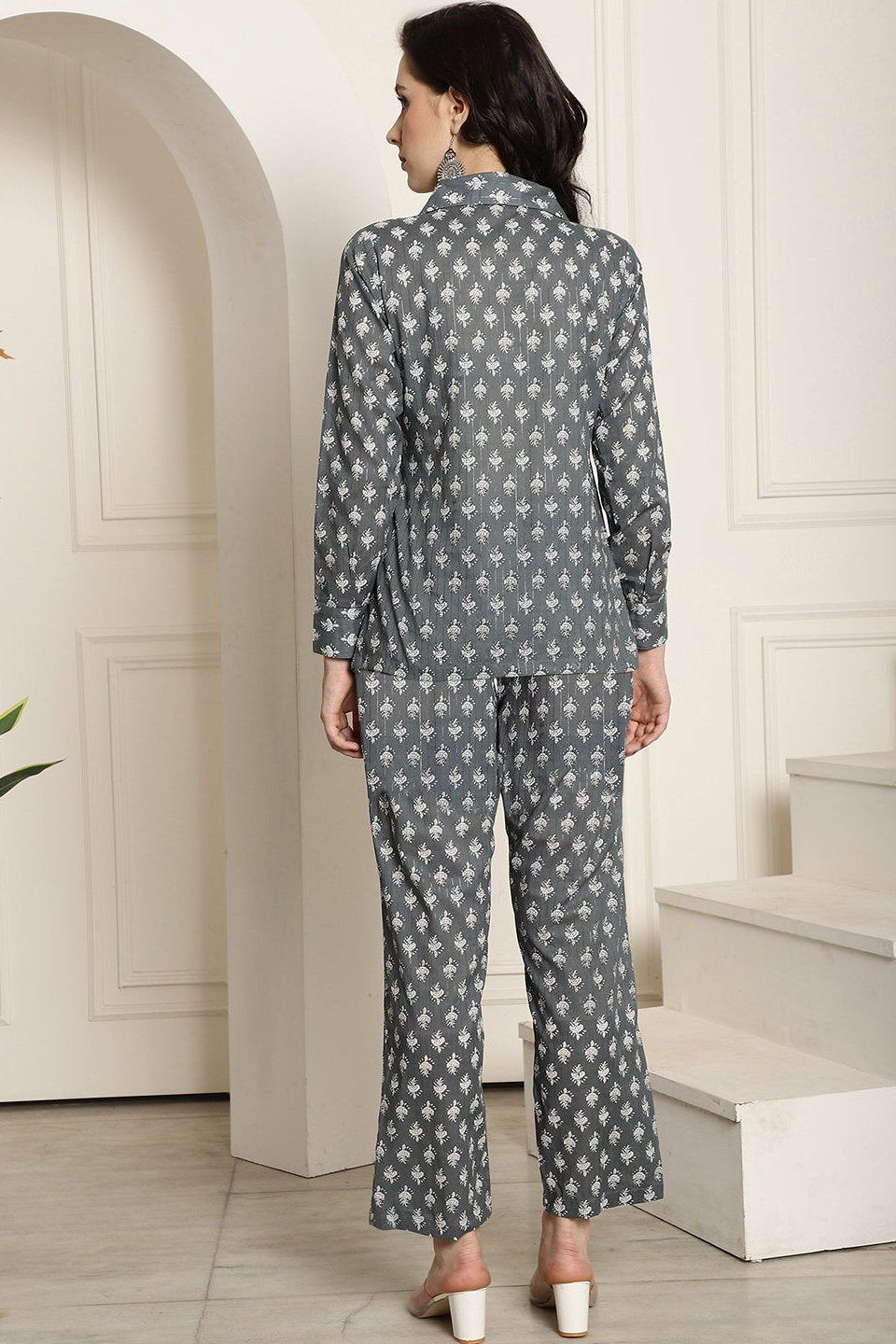 Back view of a model styling the grey floral co-ord outfit.