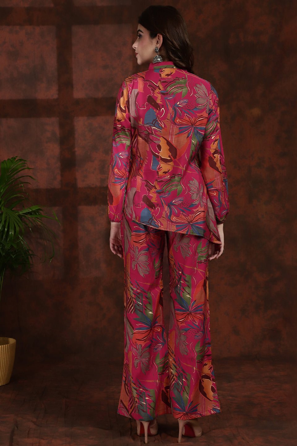 Back view of model styling Pink floral co-ord outfit