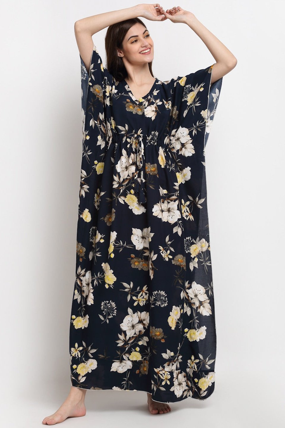 Woman wearing navy blue floral printed Kaftan Dress
