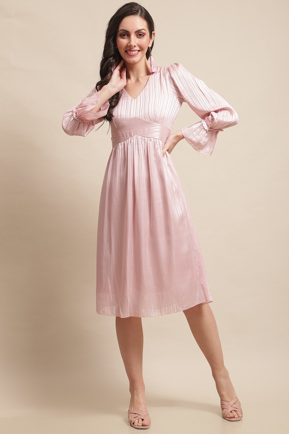 Lifestyle shot of pink printed casual dress for women