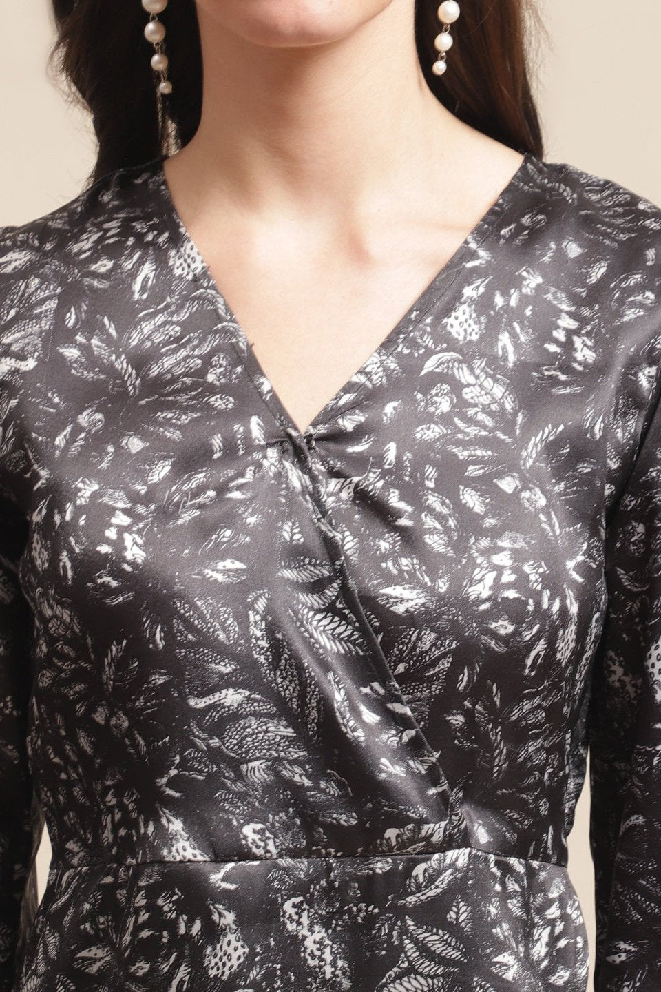 Lifestyle shot of black solid satin dress