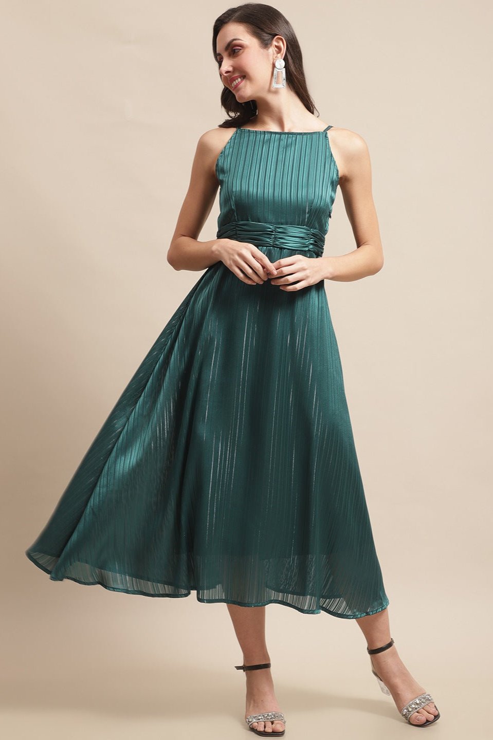 Woman wearing green printed georgette dress