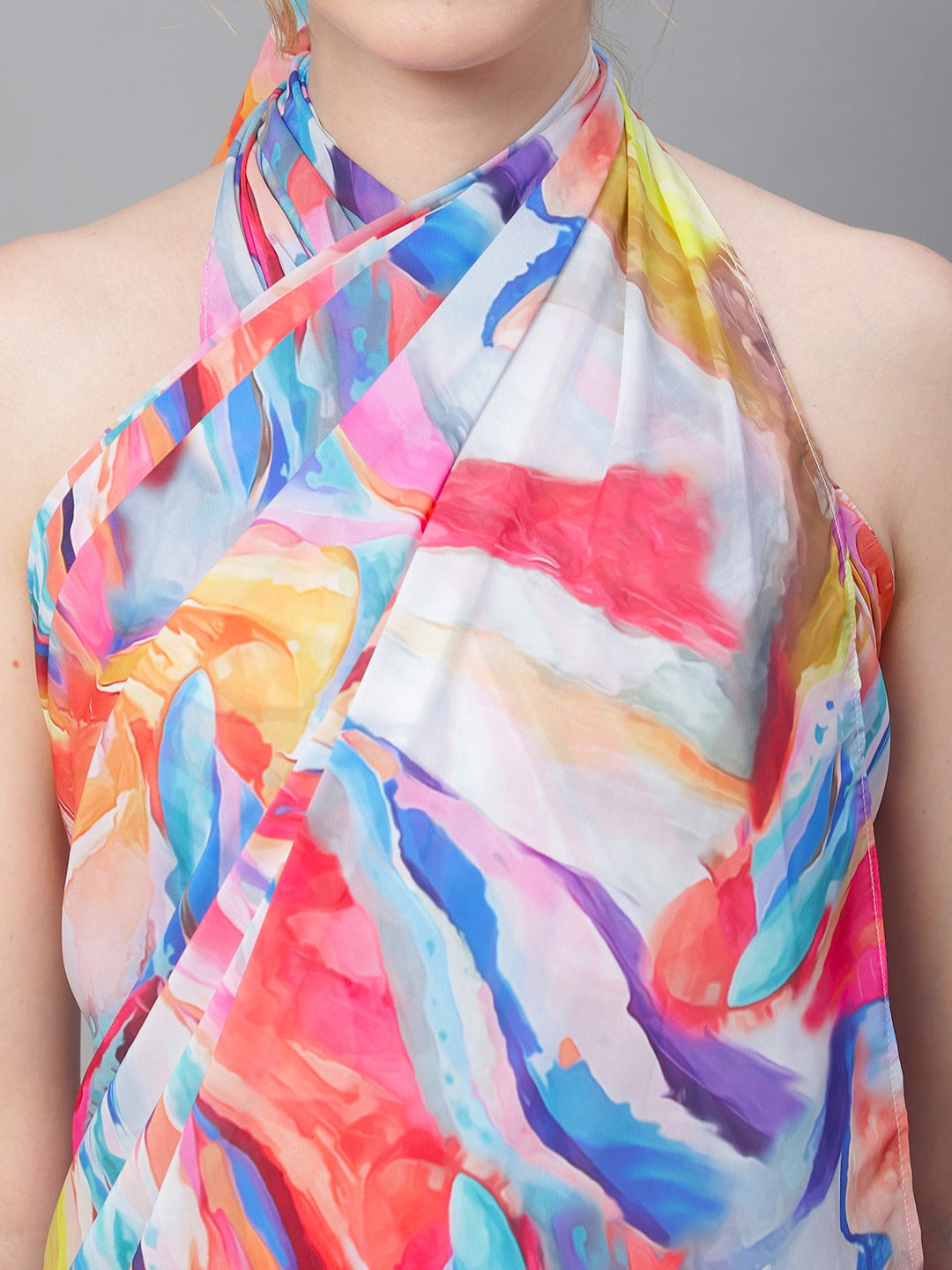 Close-up of georgette fabric on multicolor beach dress