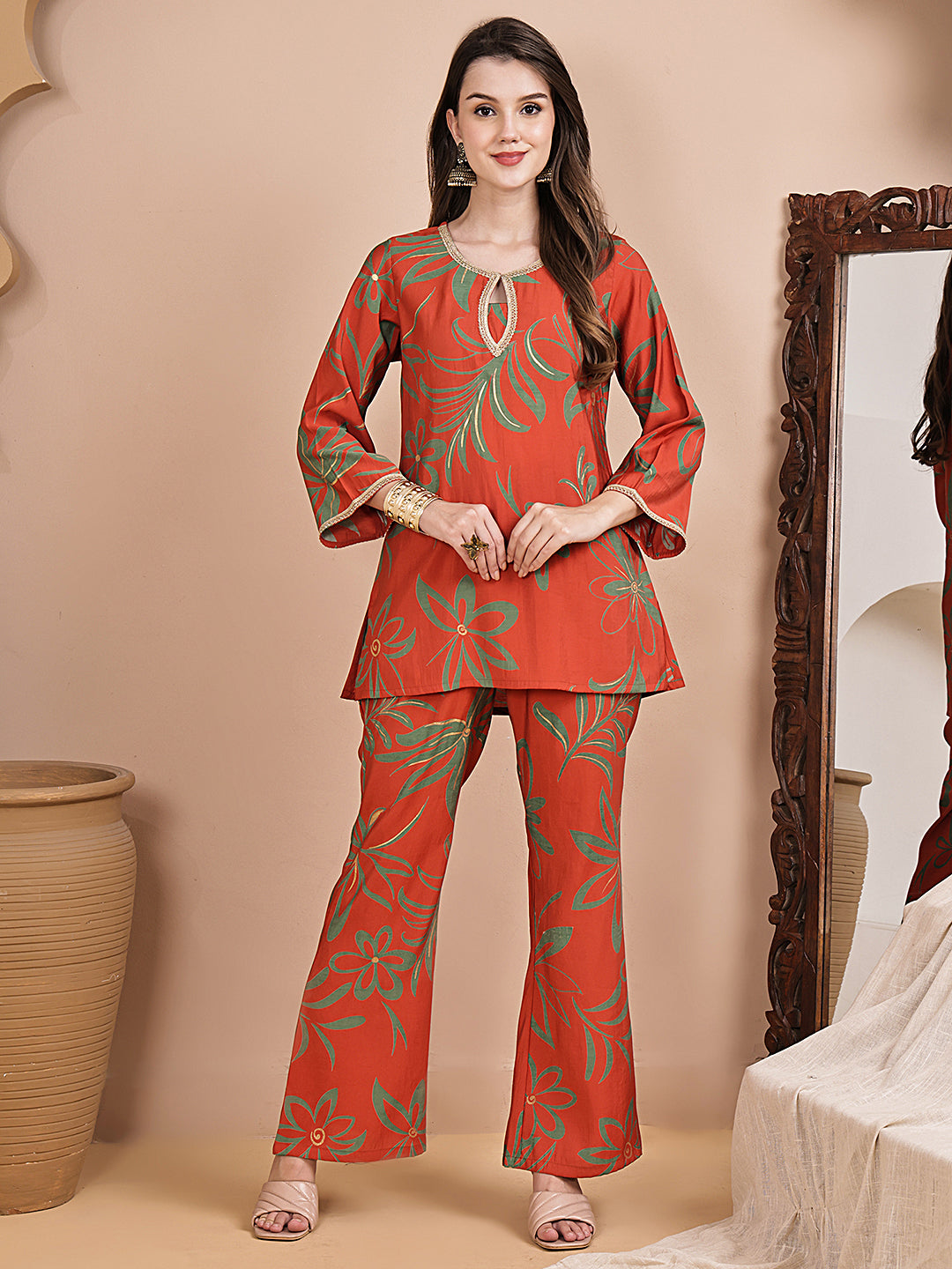 Woman wearing orange abstract printed Co-Ord Set