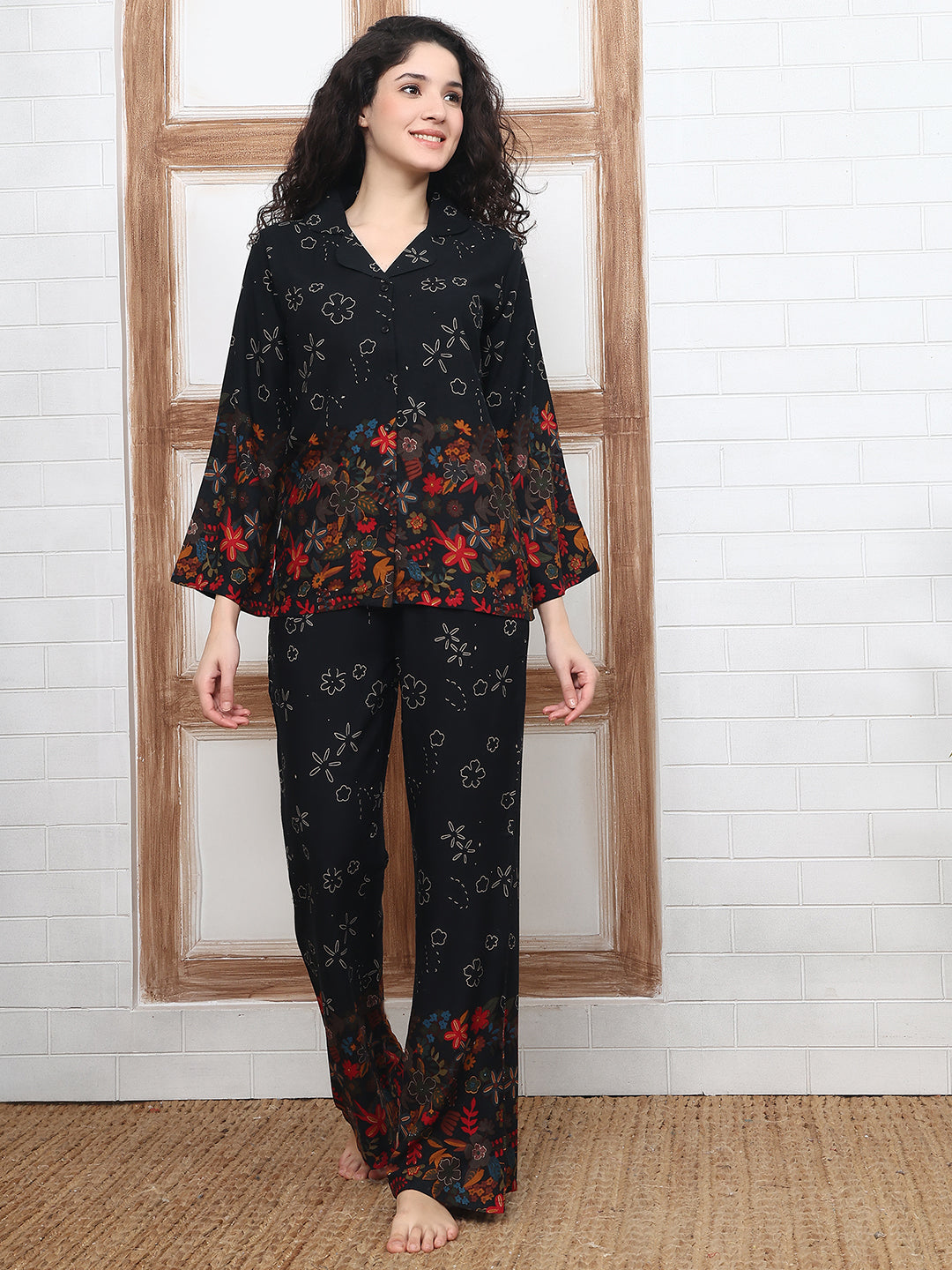 Woman wearing Black Floral Night Suit