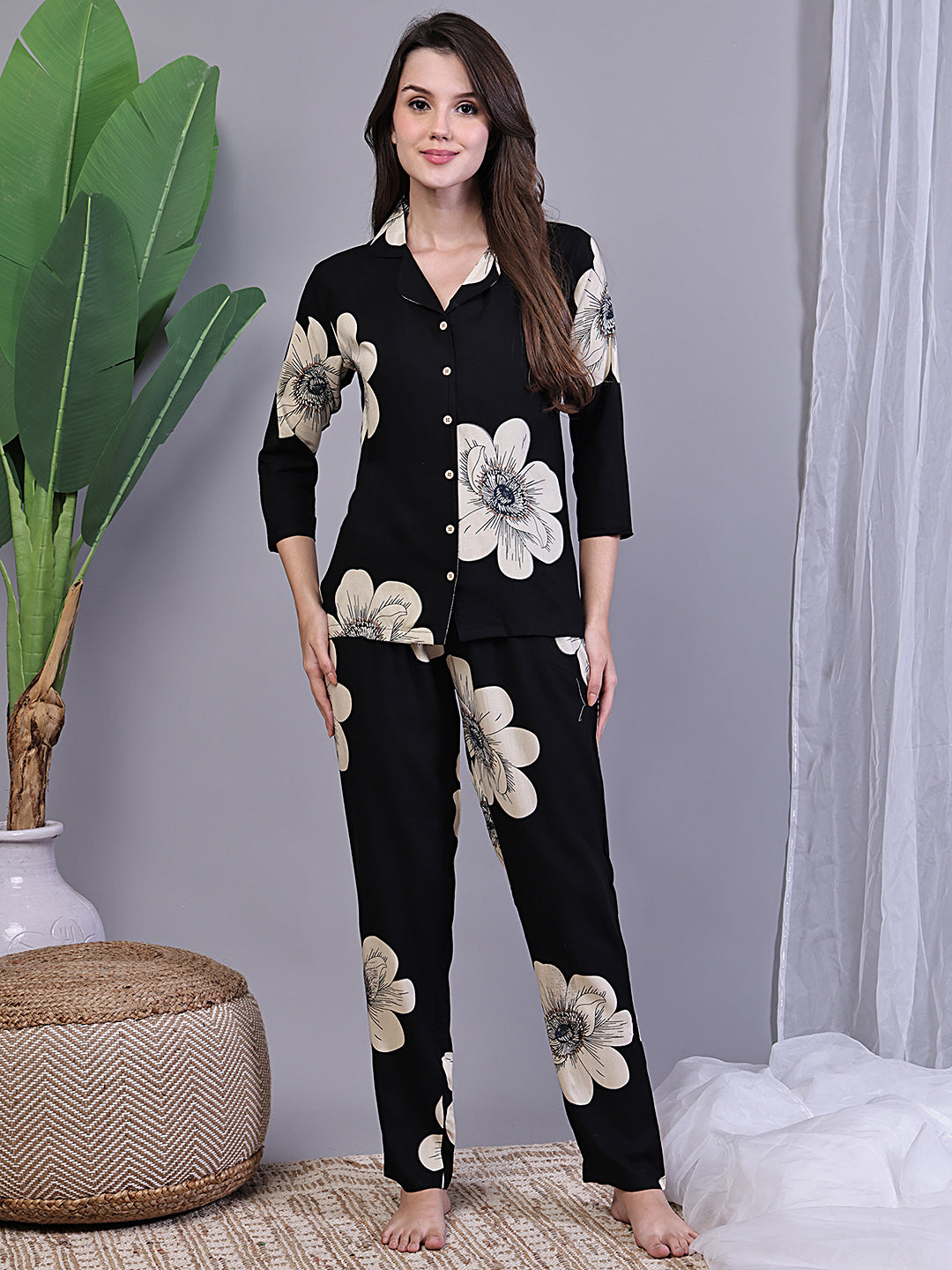 Woman wearing Black Floral Night Suit