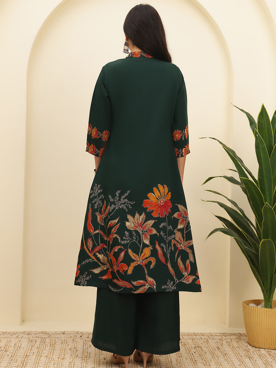 Back view of model styling Green floral co-ord outfit