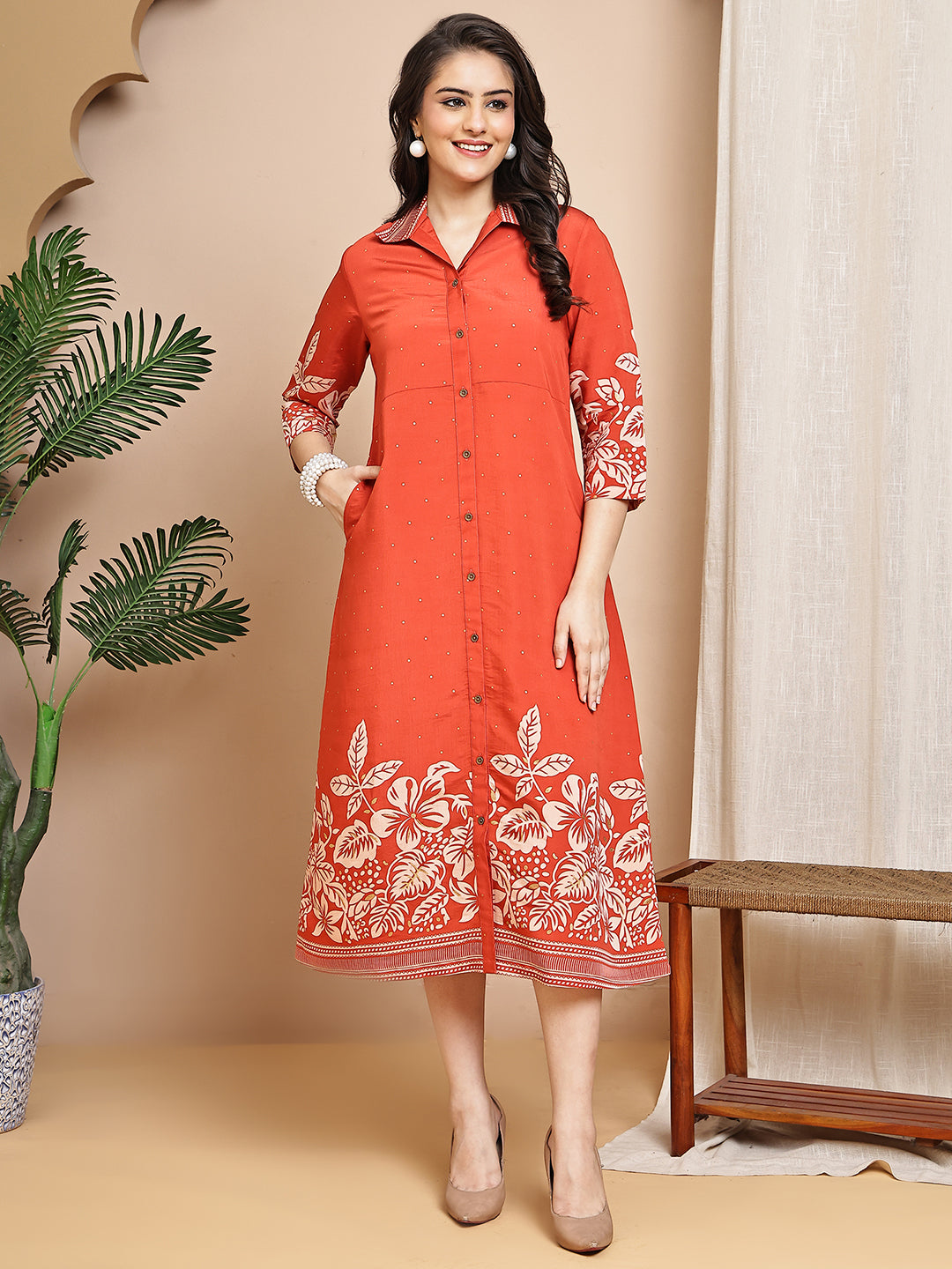 Close-up of chanderi fabric detail on orange Dresses for Women
