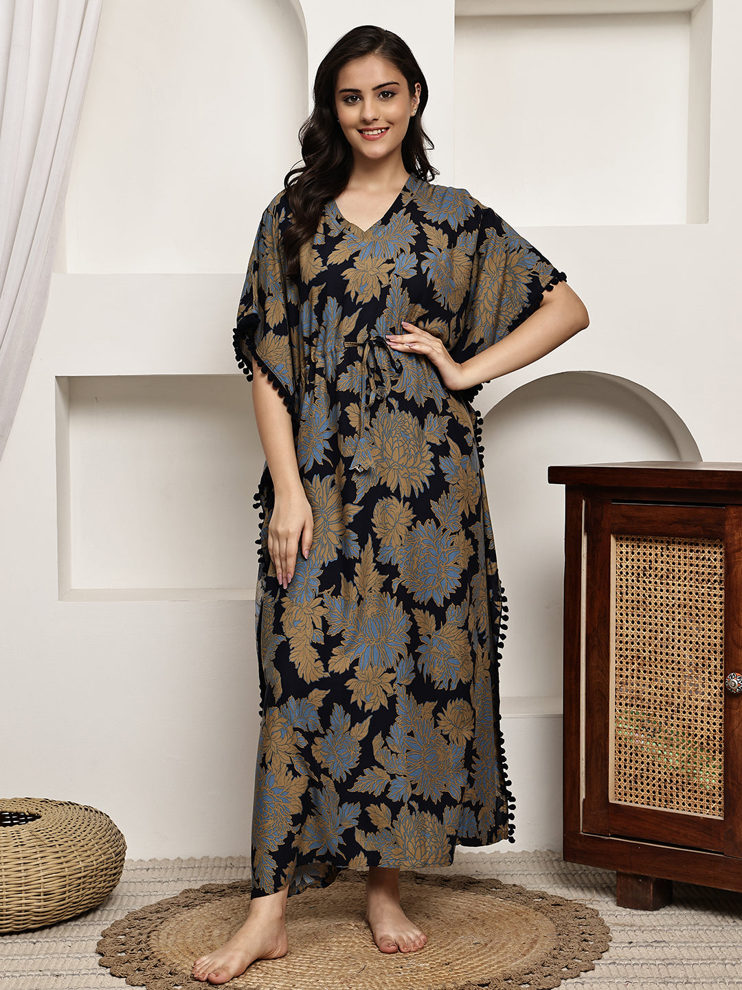 Woman wearing navy floral printed Kaftan Dress