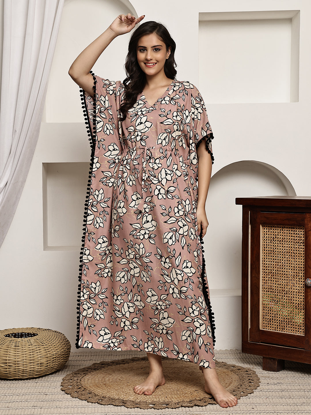 Woman wearing pink floral printed Kaftan Dress 
