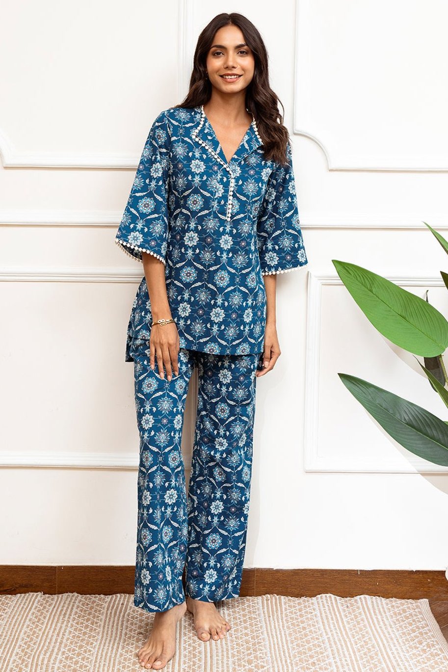 Woman wearing Blue Floral Printed Night Suit