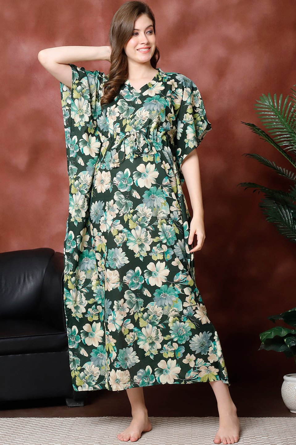 Woman wearing green floral printed Kaftan Dress
