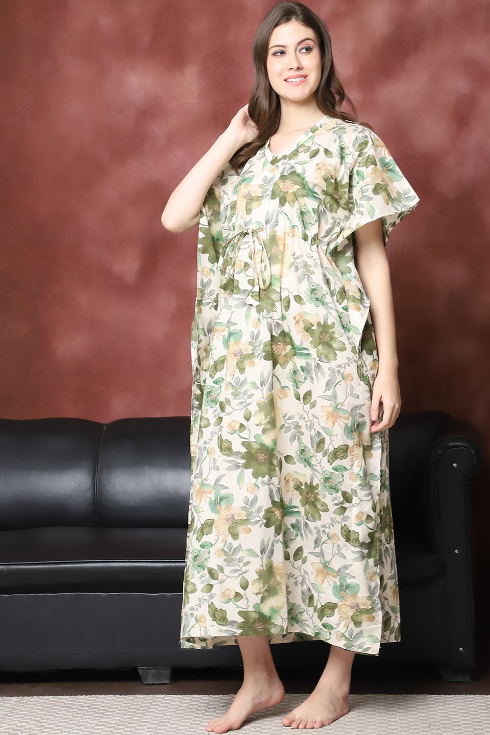 Woman wearing green floral Kaftan Dress