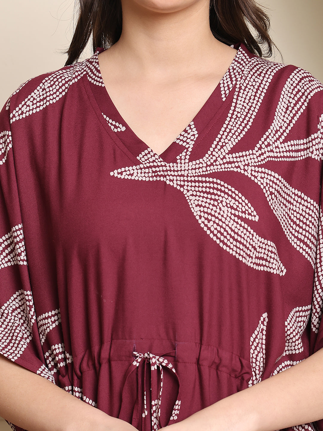 Close-up of viscose rayon fabric detail on purple Kaftan Dress