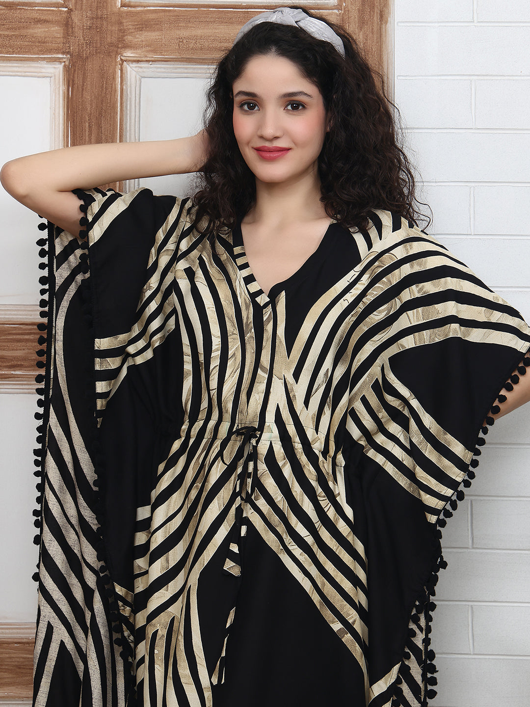 Close-up of viscose rayon fabric on black Kaftan Dress