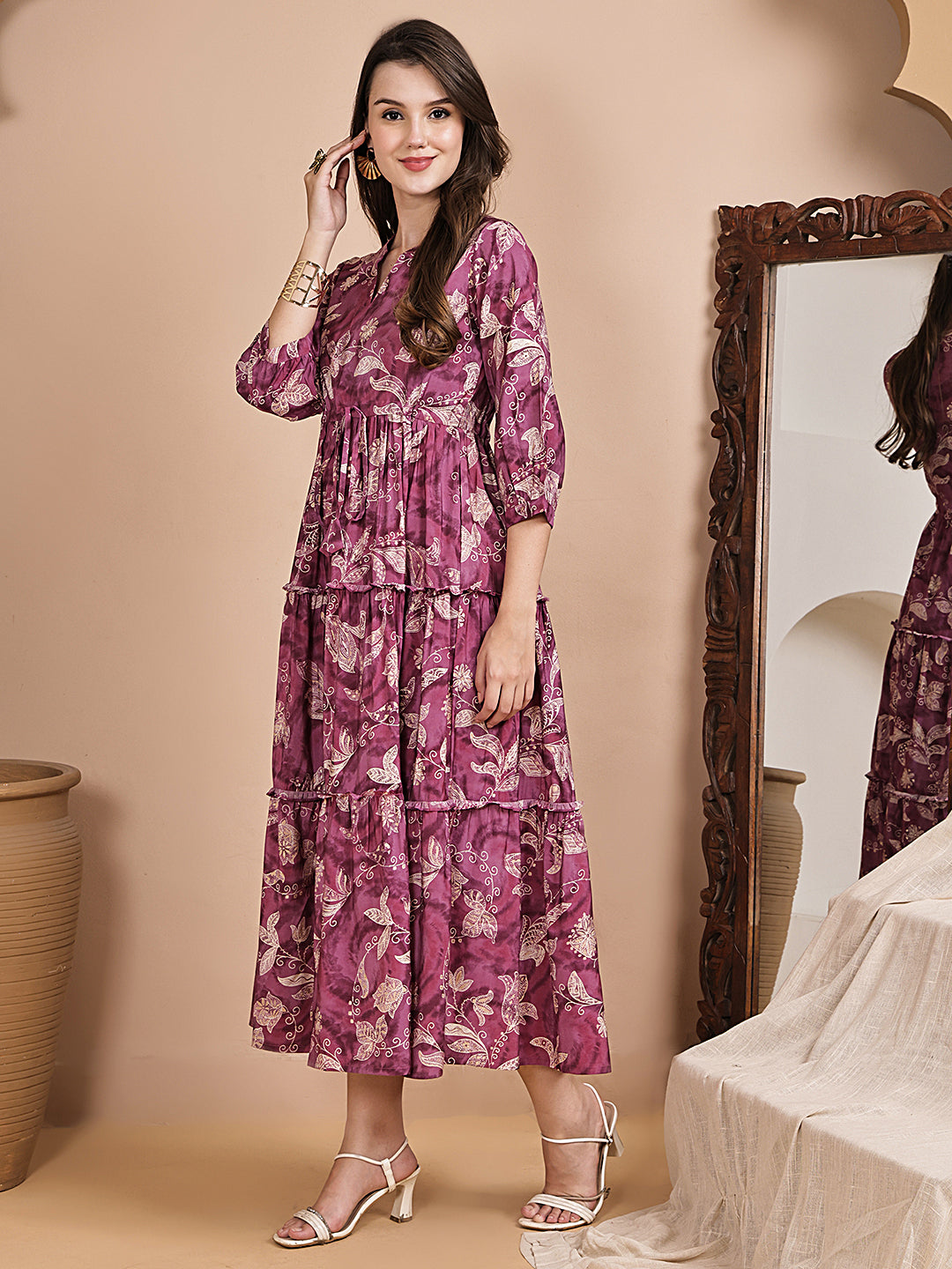 Woman wearing purple floral printed dress 