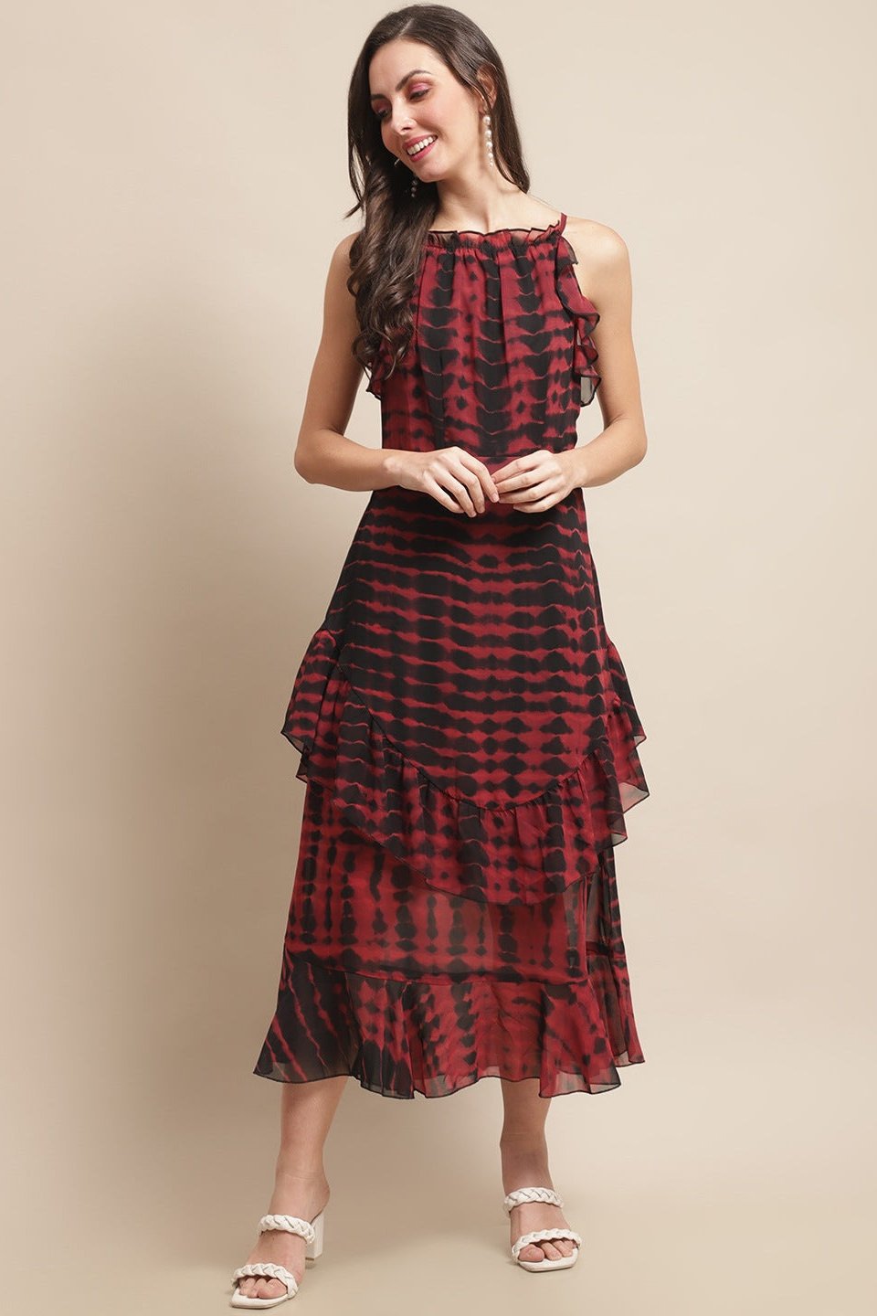 Close-up of soft georgette fabric on maroon dresses for women